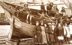 Children on fishing boat c1912